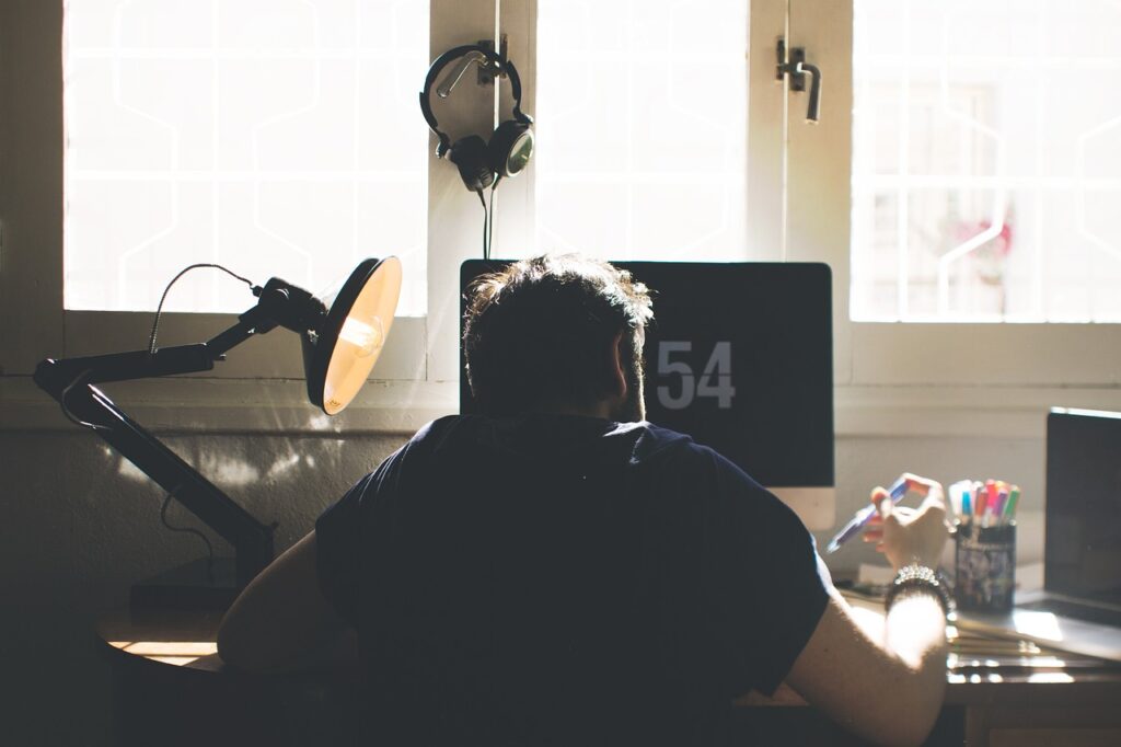 man, chair, computer-1866784.jpg